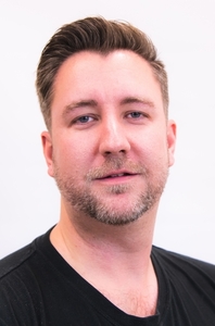 Adam Rodgers&squot;s Headshot